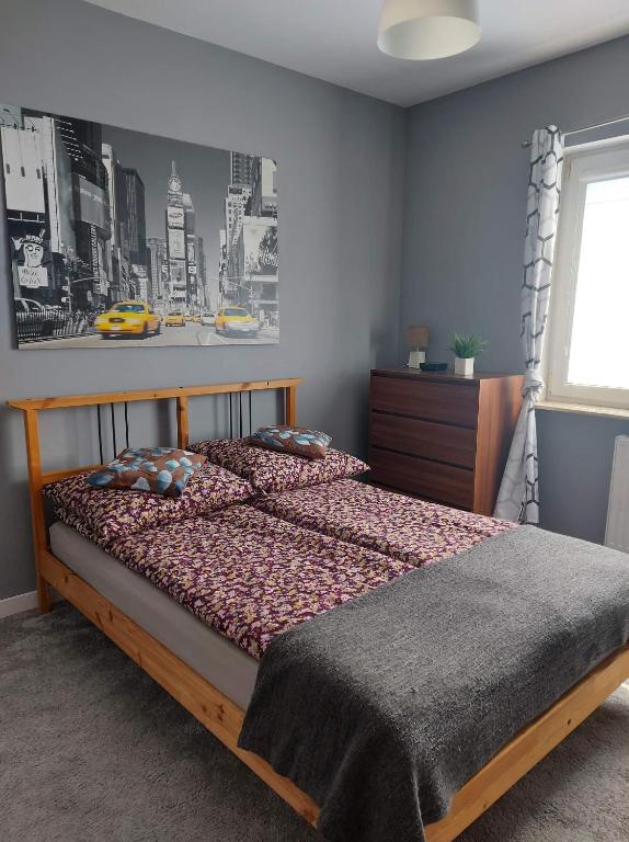 Postel nebo postele na pokoji v ubytování Apartament WAWELSKA