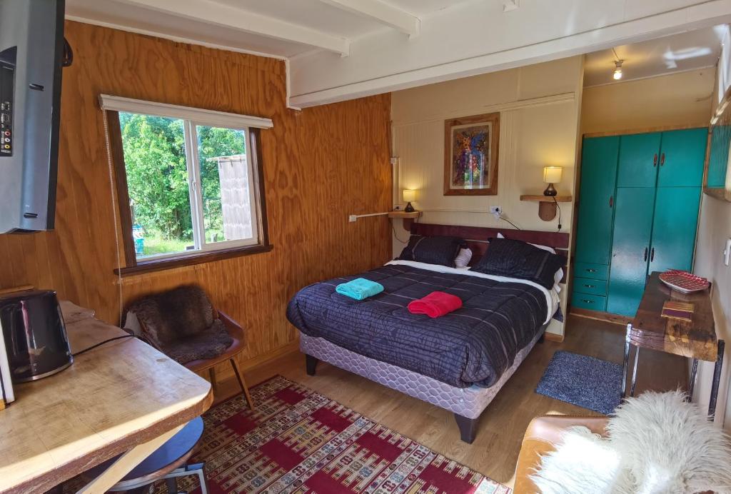 Ένα ή περισσότερα κρεβάτια σε δωμάτιο στο Kalas Cabañas