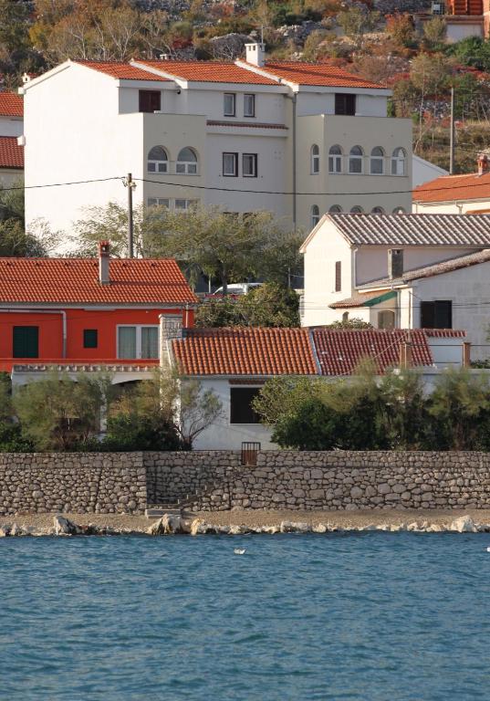 a view of a city from the water at Apartments by the sea Vinjerac, Zadar - 5811 in Vinjerac