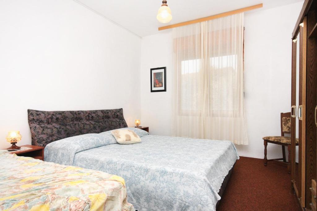 Posteľ alebo postele v izbe v ubytovaní Apartments with parking spaces Sukosan, Zadar - 5777