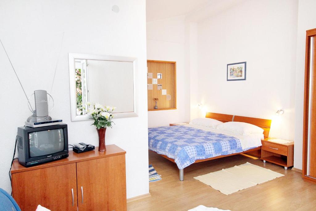 Postel nebo postele na pokoji v ubytování Apartment Zadar - Diklo 5880c
