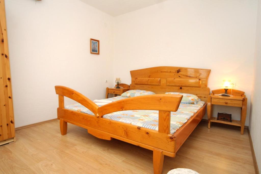 Postel nebo postele na pokoji v ubytování Apartments by the sea Lumbarda, Korcula - 4376