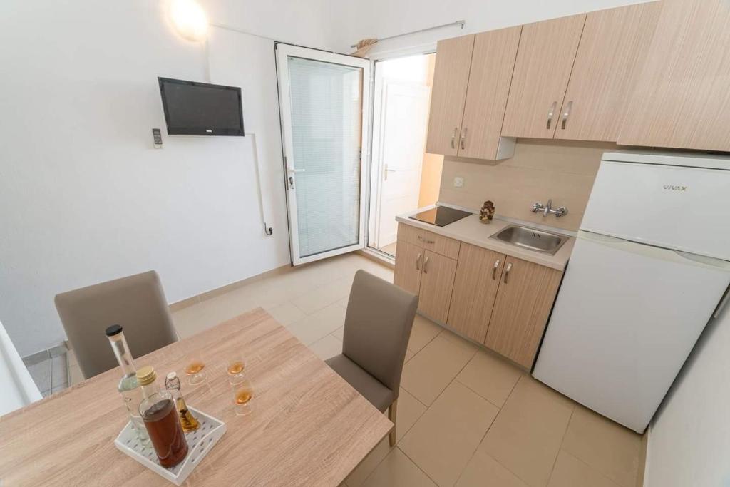 Kuchyň nebo kuchyňský kout v ubytování Apartments with a parking space Privlaka, Zadar - 5746