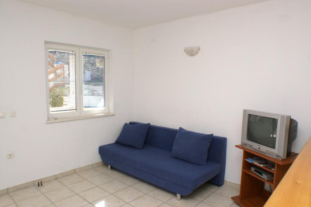 Televízia a/alebo spoločenská miestnosť v ubytovaní Apartments by the sea Korcula - 4349