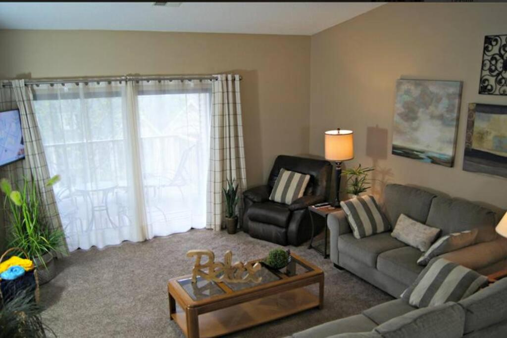 a living room with a couch and a chair at Branson Krehbiel Condo 2Bd 2Bath in Branson