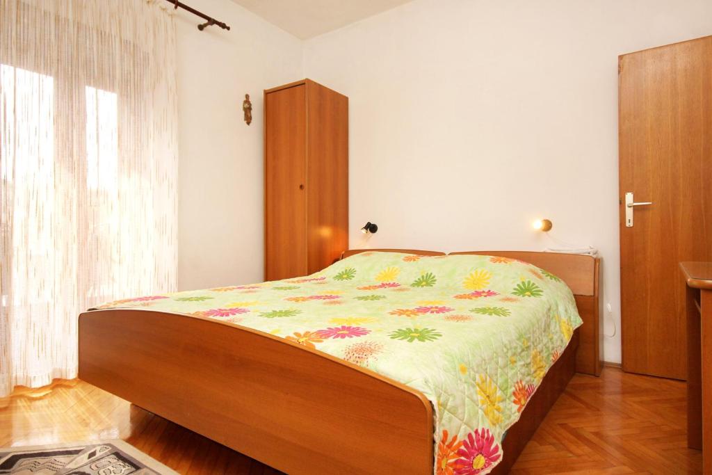 Posteľ alebo postele v izbe v ubytovaní Apartments and rooms by the sea Racisce, Korcula - 4341