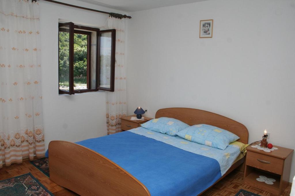 เตียงในห้องที่ Apartments by the sea Cove Vela Prapratna (Peljesac) - 4514