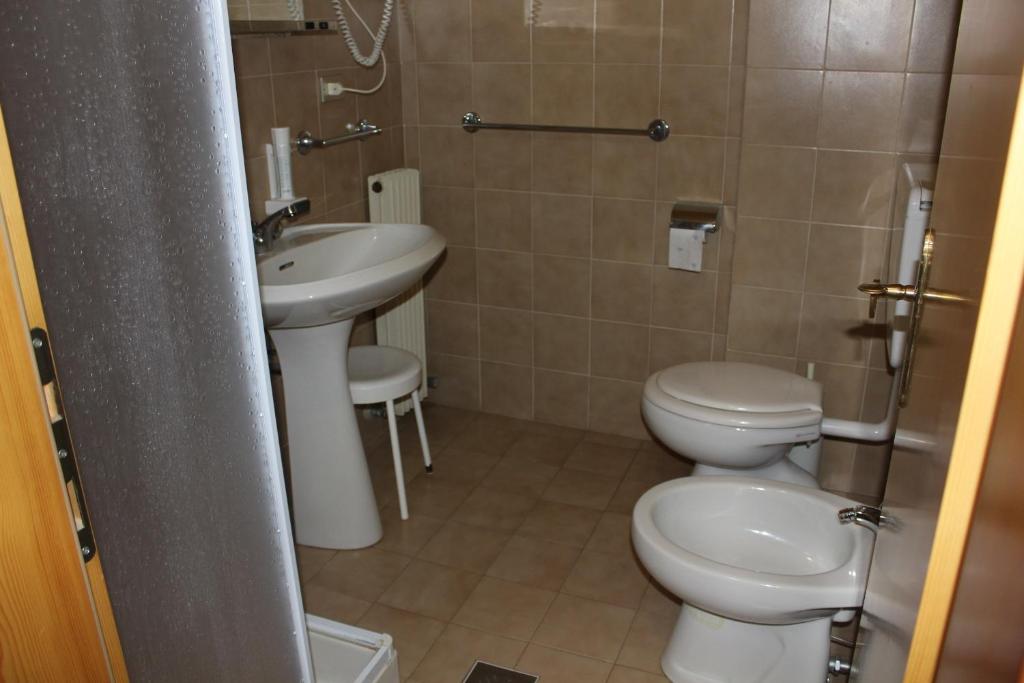 Koupelna v ubytování Hotel Mignon