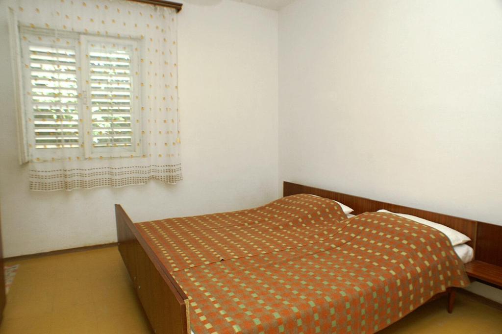 Posteľ alebo postele v izbe v ubytovaní Apartments by the sea Drace, Peljesac - 4550