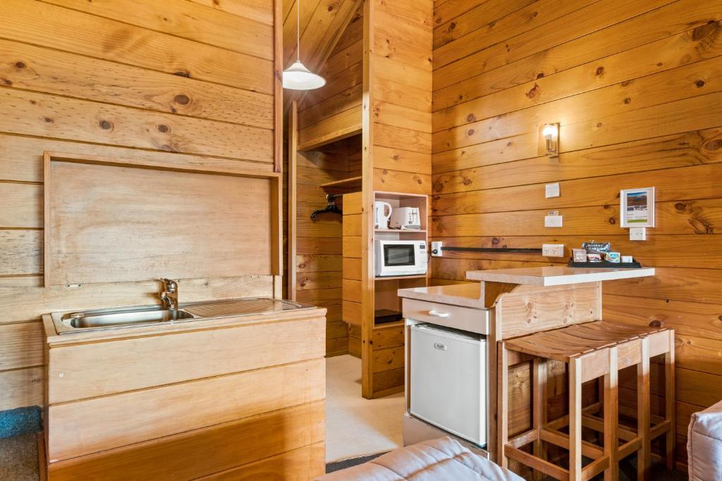 Kuchyň nebo kuchyňský kout v ubytování Aspiring Lodge Motel