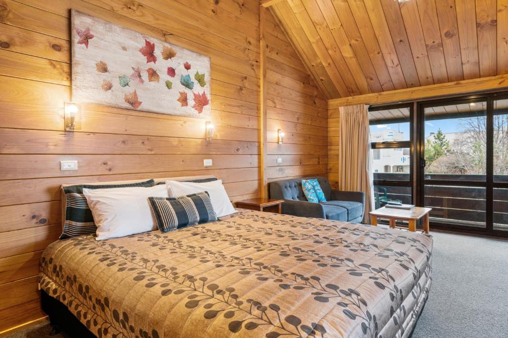 Postel nebo postele na pokoji v ubytování Aspiring Lodge Motel