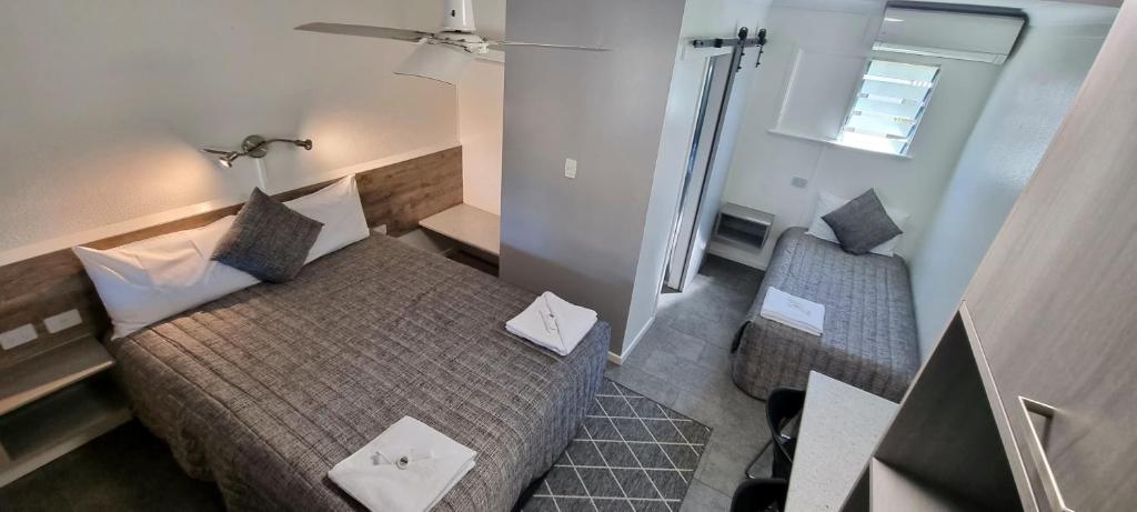 Postel nebo postele na pokoji v ubytování Y Motels Kingaroy