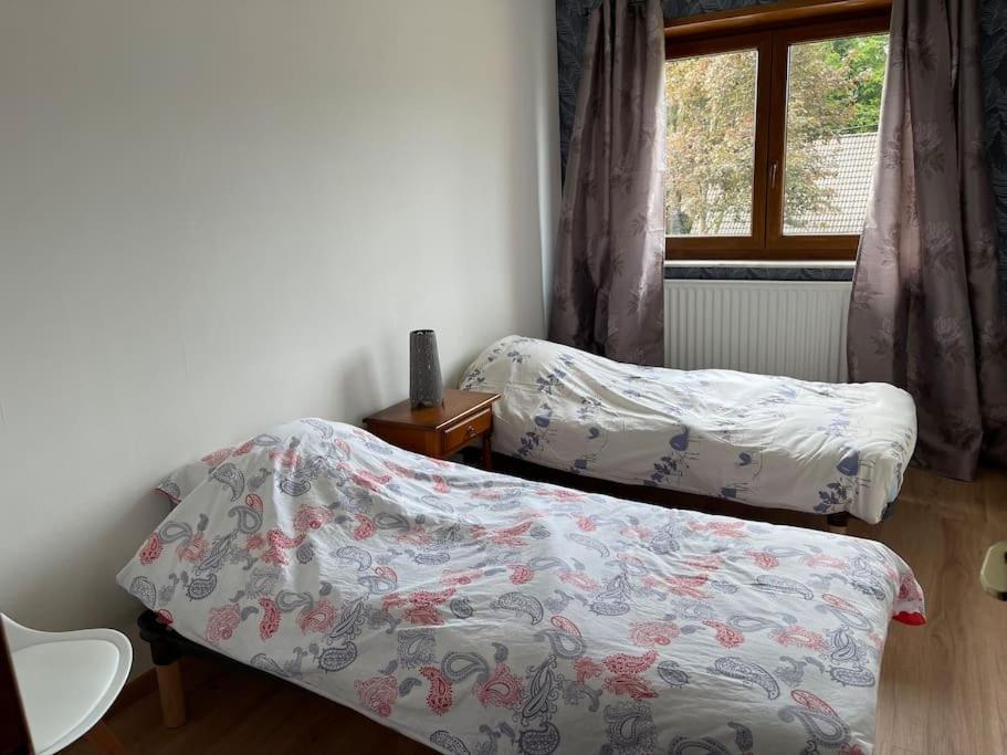 Postel nebo postele na pokoji v ubytování Le gîte de la Champagne