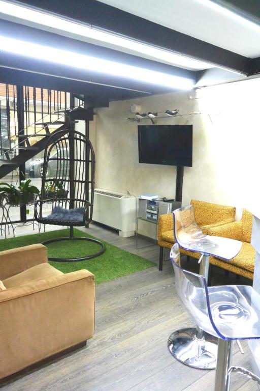 TV a/nebo společenská místnost v ubytování Hotel Balbo