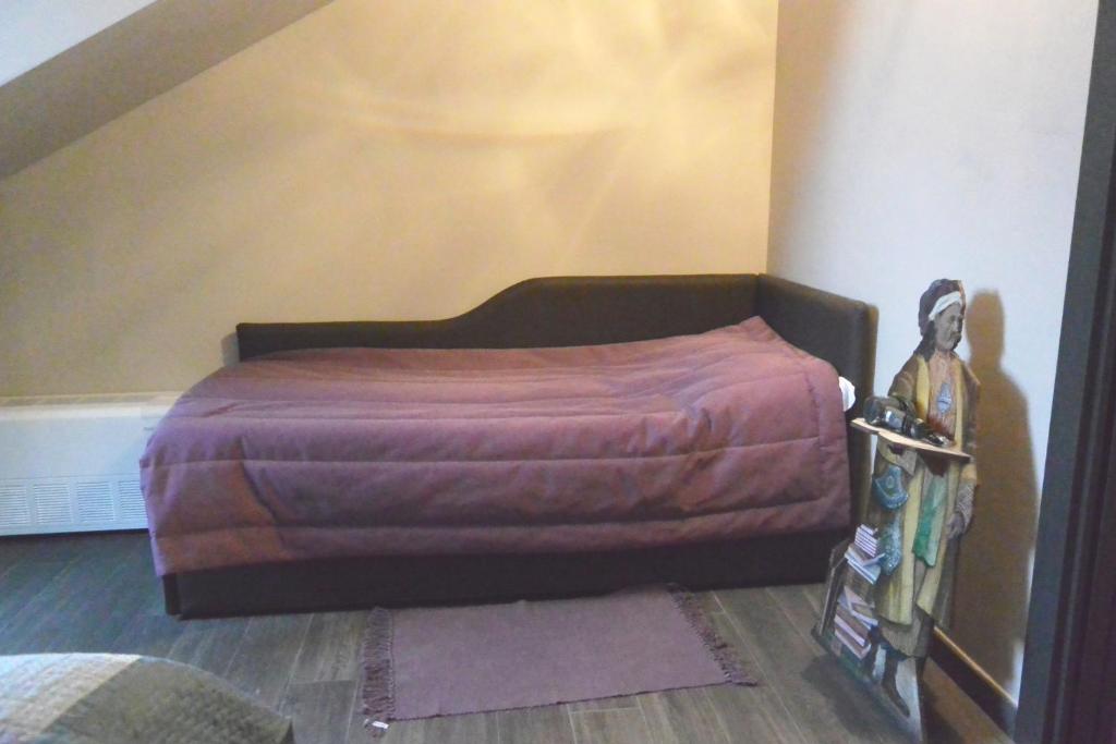 Postel nebo postele na pokoji v ubytování Hotel Balbo