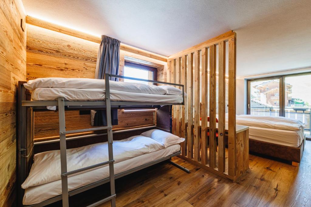 Postel nebo postele na pokoji v ubytování Steinbock B&B - Apartaments