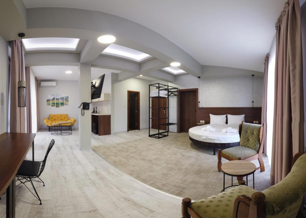 Postel nebo postele na pokoji v ubytování Clepsydra Residence