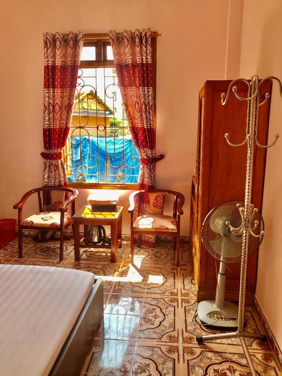 Postel nebo postele na pokoji v ubytování Viet Duc Guest House