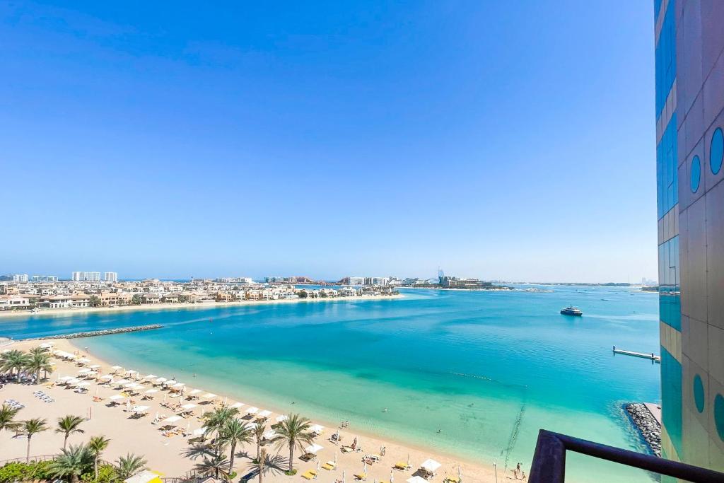a view of the beach from a building at bnbmehomes - Look over the Palm and Sea from Every Room - 504 in Dubai