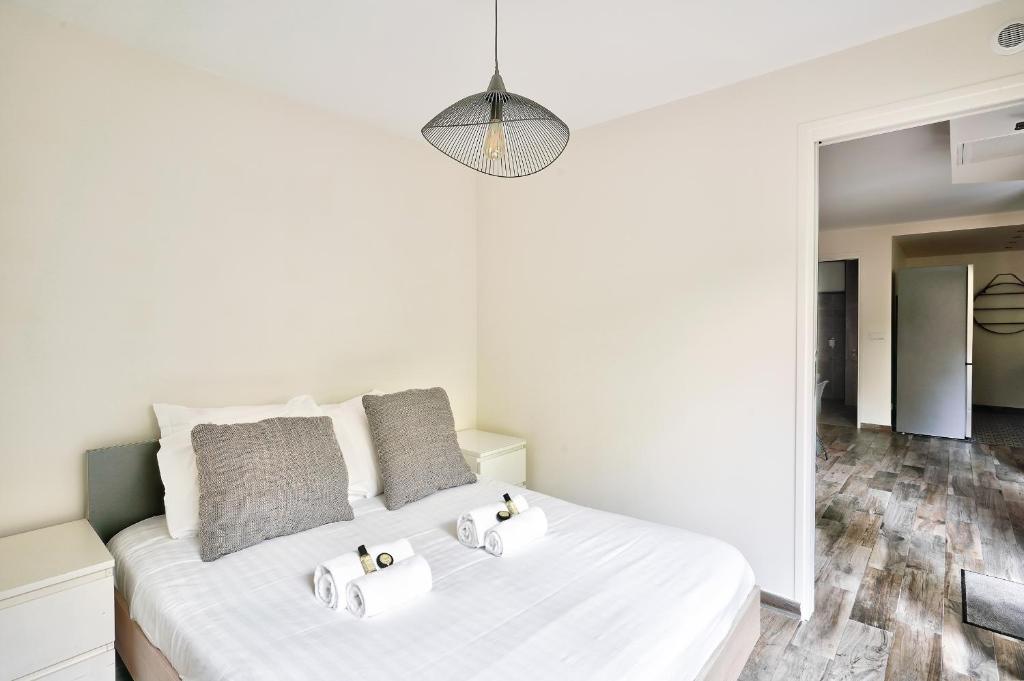Posteľ alebo postele v izbe v ubytovaní Bel appartement idéal pour 4 personnes, 2 chambres