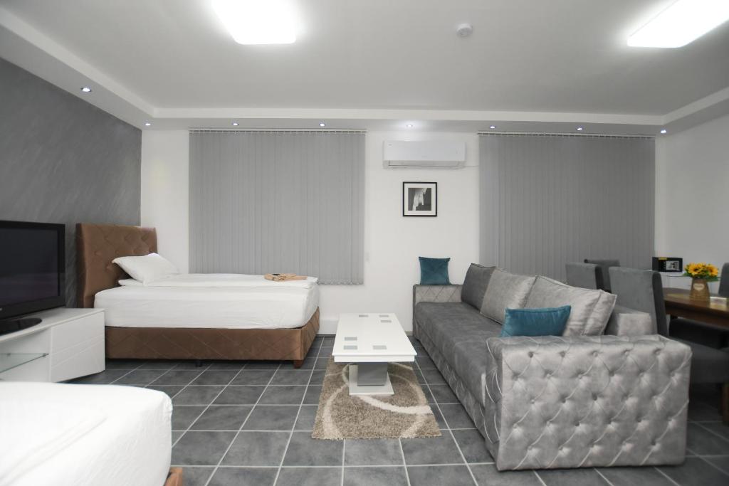 Postel nebo postele na pokoji v ubytování Relax Apartmani Kladovo
