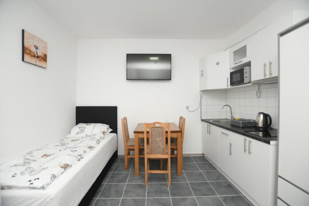 Kuchyň nebo kuchyňský kout v ubytování Relax Apartmani Kladovo