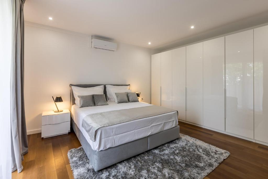 Postel nebo postele na pokoji v ubytování Apartment FORTUNA