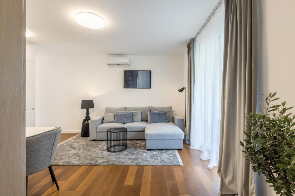 TV a/nebo společenská místnost v ubytování Apartment FORTUNA