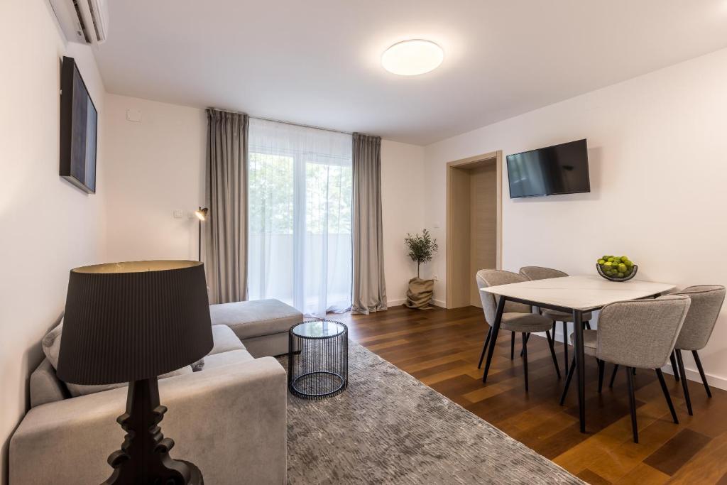 TV a/nebo společenská místnost v ubytování Apartment FORTUNA