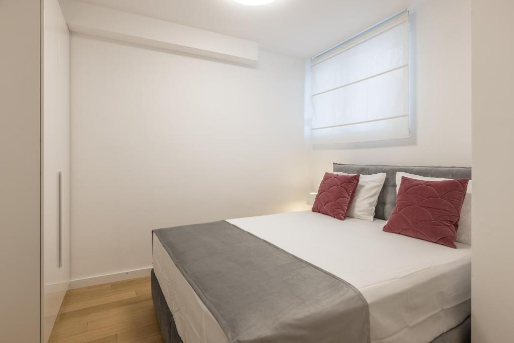 Postel nebo postele na pokoji v ubytování Apartment FORTUNA