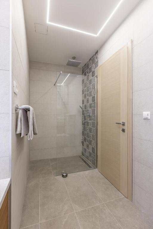 Koupelna v ubytování Apartment FORTUNA