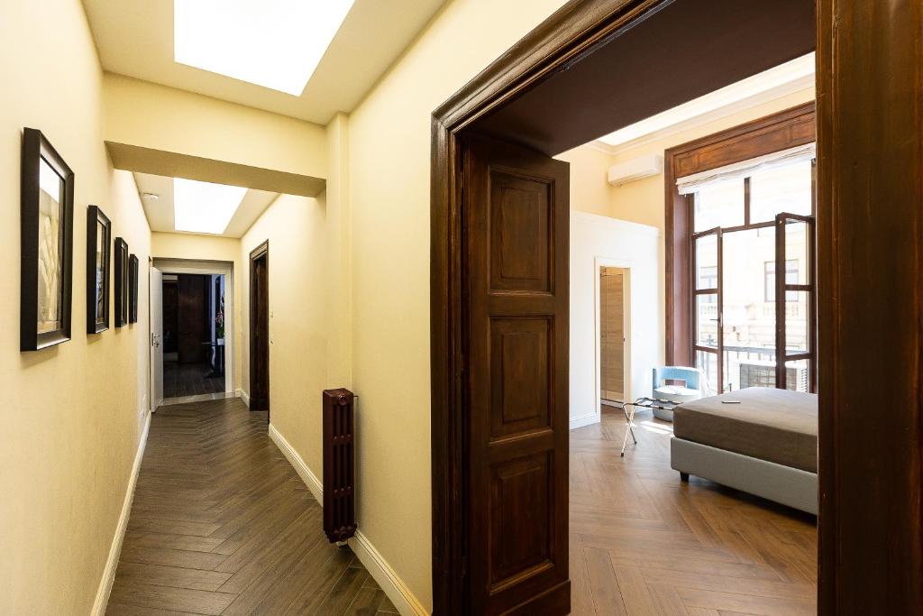 Posteľ alebo postele v izbe v ubytovaní SPA Apartment Via Barberini