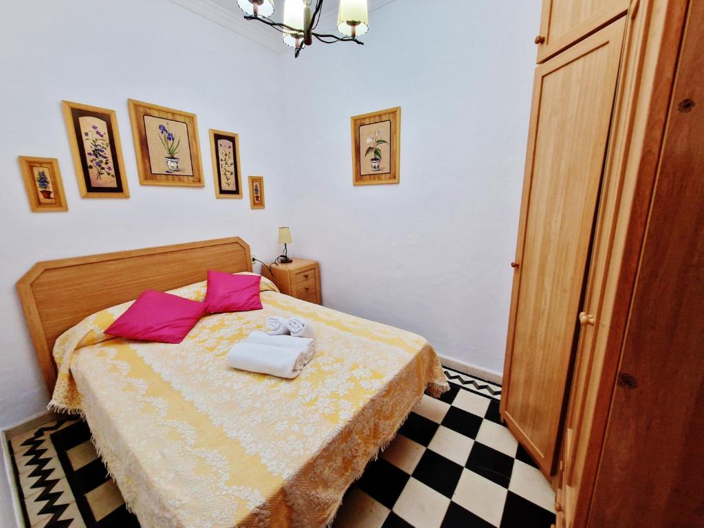 Postel nebo postele na pokoji v ubytování Velez Nazari Casa Molina