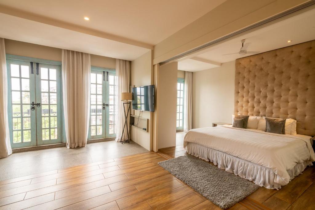 Postel nebo postele na pokoji v ubytování Villa Donna