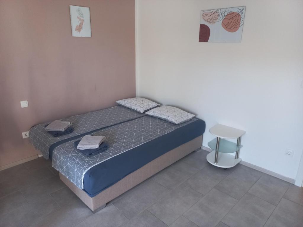 Postel nebo postele na pokoji v ubytování Apartments Rosemary Ljubljana & Free Parking