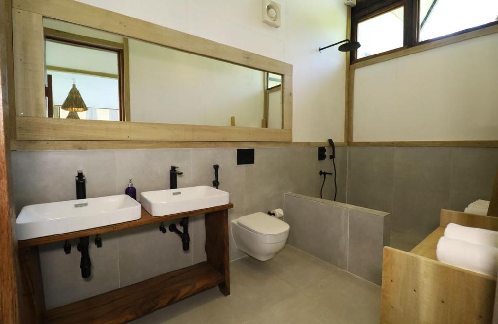 Koupelna v ubytování Satya Boutique Resort & Spa