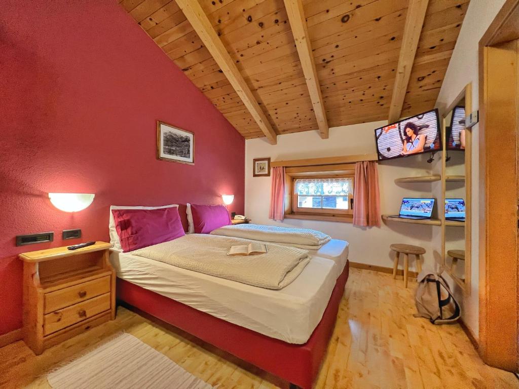Posteľ alebo postele v izbe v ubytovaní Garni Francescato