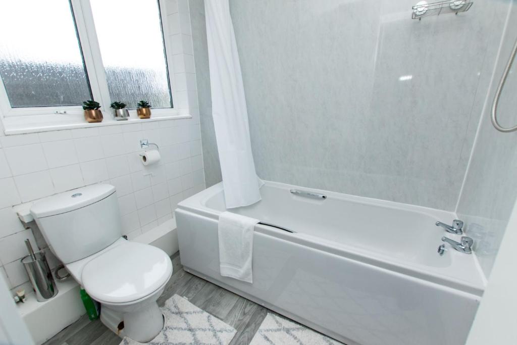 Ett badrum på K Suites - Trafalgar Road