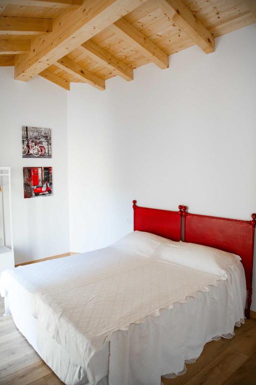 Postel nebo postele na pokoji v ubytování Corte Torchio B&B