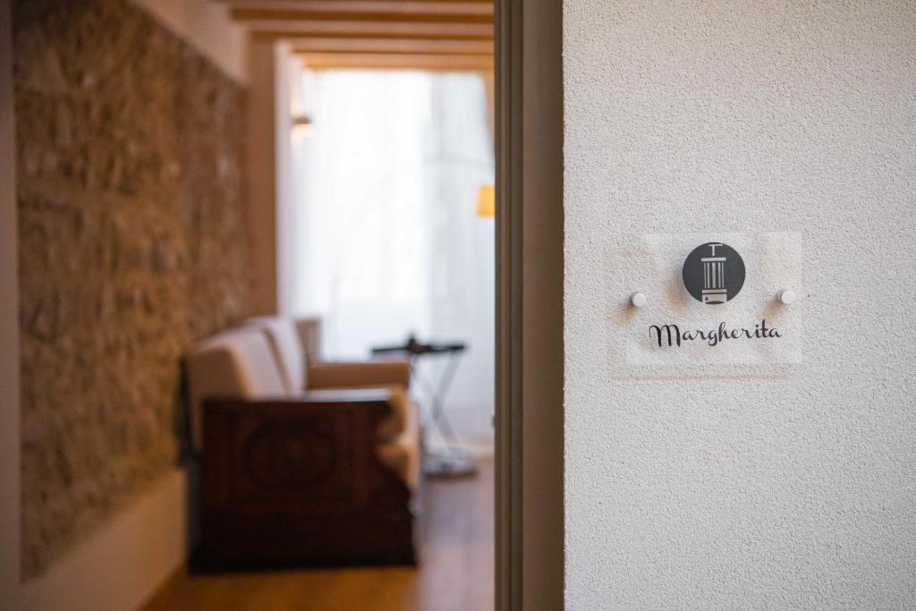 Postel nebo postele na pokoji v ubytování Corte Torchio B&B