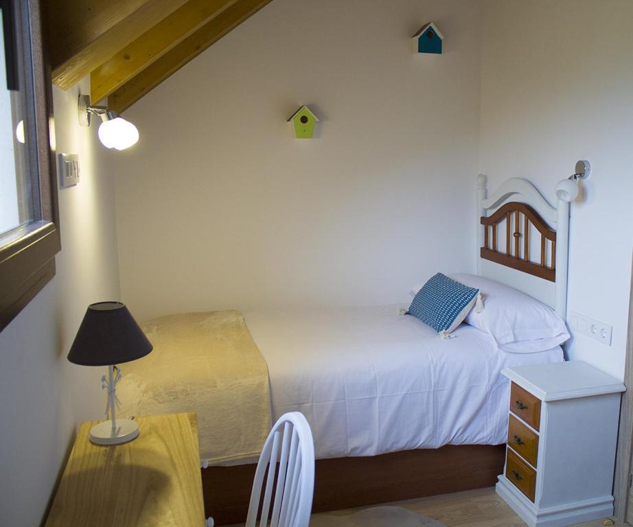 Postel nebo postele na pokoji v ubytování Vente a Babia