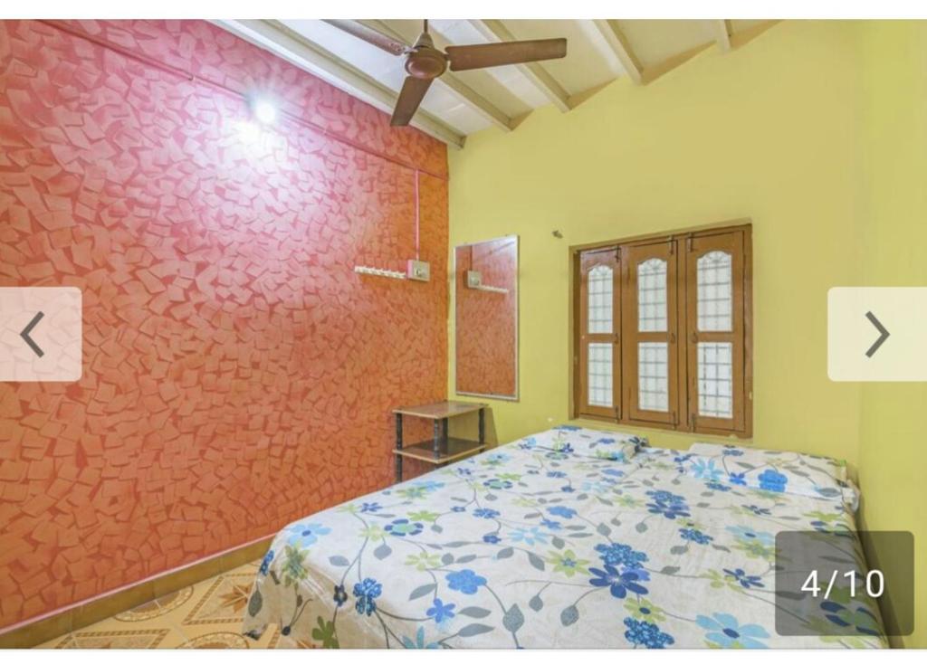 Letto o letti in una camera di Archana Guest House River View