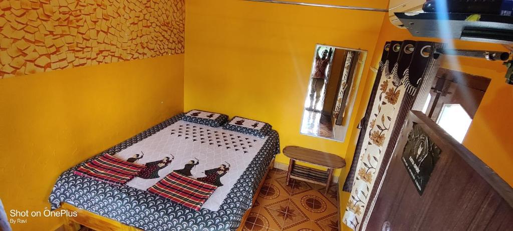 Letto o letti in una camera di Archana Guest House River View