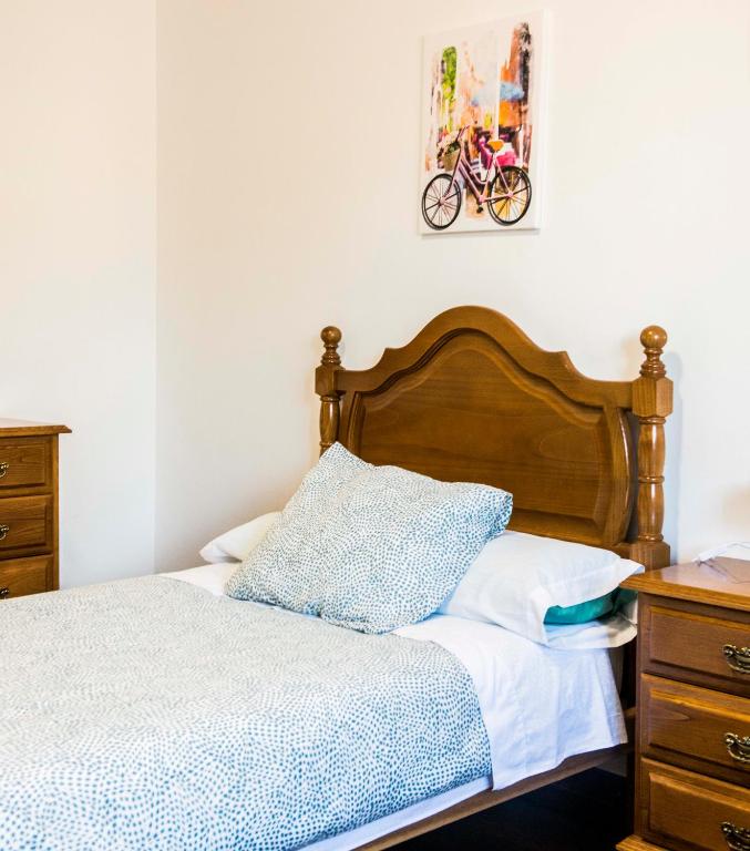 A bed or beds in a room at Las Aceñas De Iris