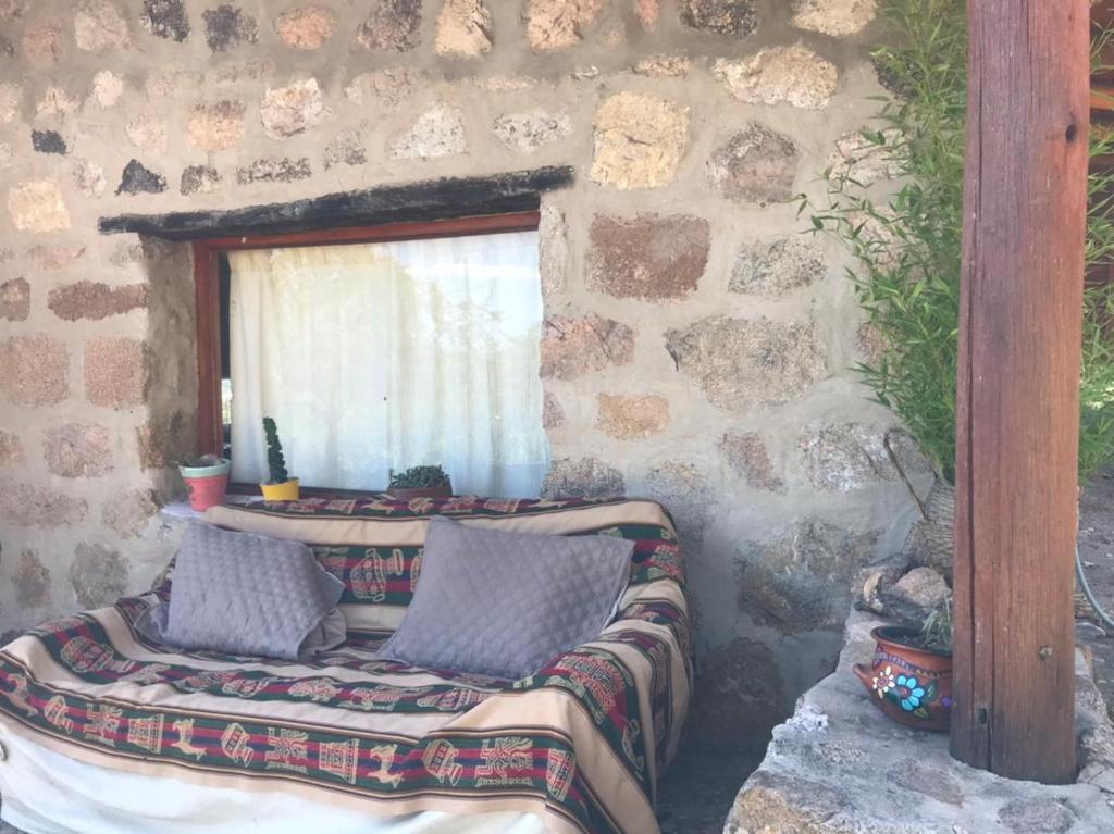 Posezení v ubytování Pachamama cabañas en la montaña
