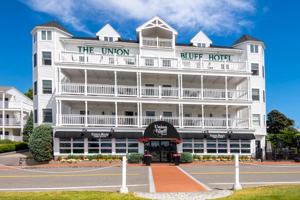 a large white building with a hotel at Union Bluff Hotel in York Beach
