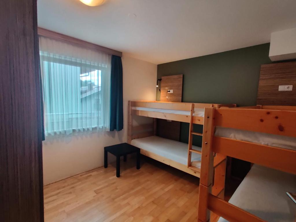 Palanda nebo palandy na pokoji v ubytování Haus Obauer by AlpenTravel