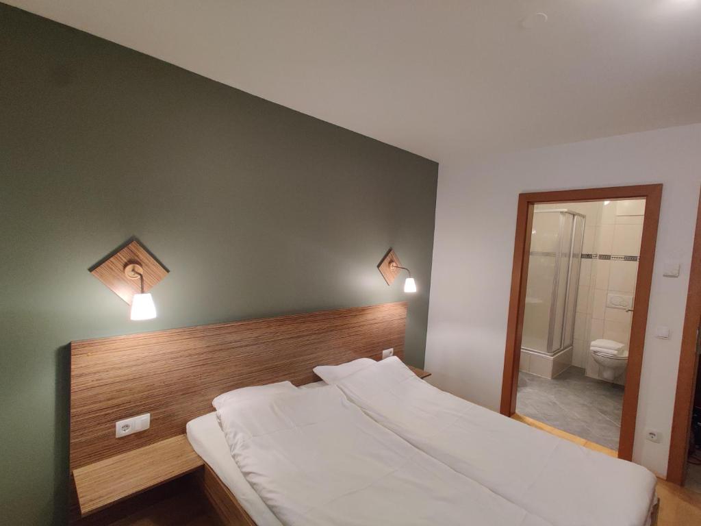 Postel nebo postele na pokoji v ubytování Haus Obauer by AlpenTravel