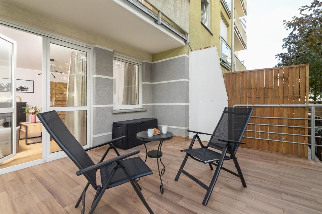 Balkón alebo terasa v ubytovaní Pleasant Apartment with Terrace Cracow by Noclegi Renters