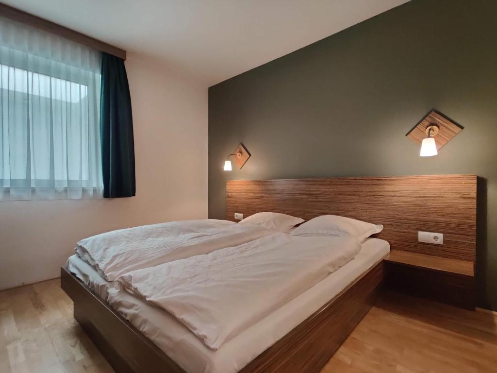 Postel nebo postele na pokoji v ubytování Haus Obauer by AlpenTravel